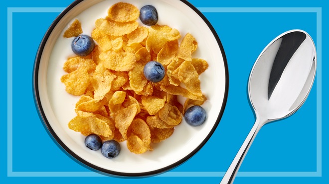 bowl of breakfast cereal on blue background